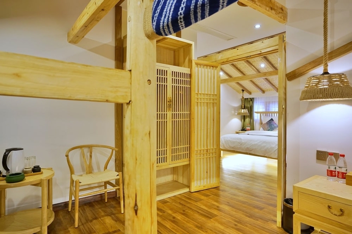 Imagen de la habitación del Hotel Yuexijiang Boutique Holiday. Foto 15