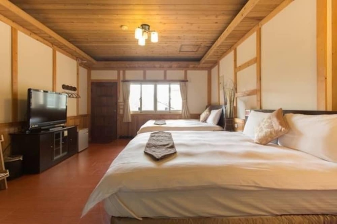 Imagen de la habitación del Hotel Yueya Villa. Foto 4