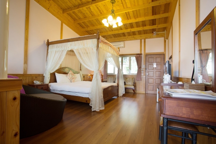 Imagen de la habitación del Hotel Yueya Villa. Foto 6