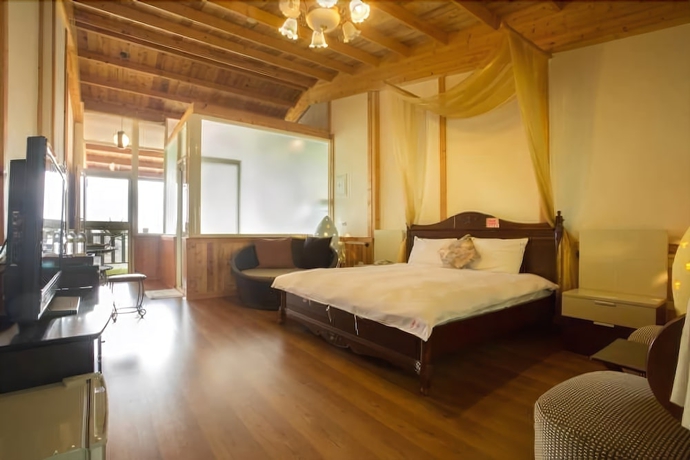 Imagen de la habitación del Hotel Yueya Villa. Foto 10
