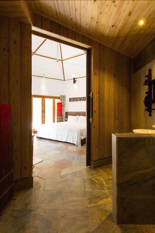 Imagen de la habitación del Hotel Yueya Villa. Foto 12