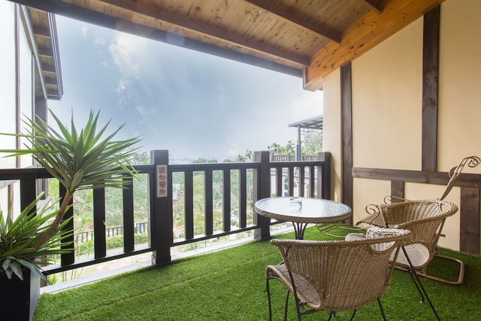 Imagen de la habitación del Hotel Yueya Villa. Foto 16