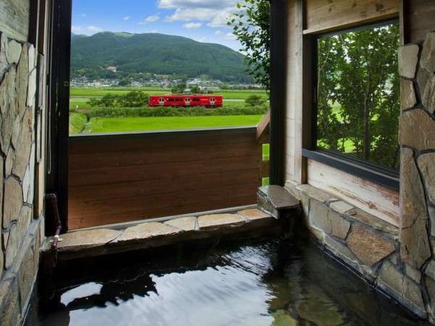 Imagen de la piscina del Hotel Yufuin Onsen Poppoan. Foto 16