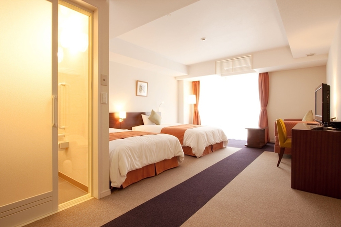 Imagen de la habitación del Hotel Yugaf Inn Okinawa. Foto 2