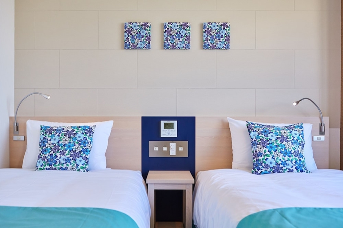 Imagen de la habitación del Hotel Yugaf Inn Okinawa. Foto 9