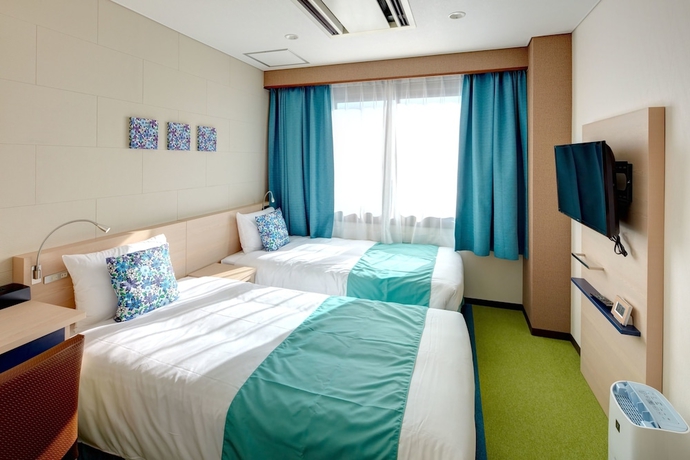 Imagen de la habitación del Hotel Yugaf Inn Okinawa. Foto 10