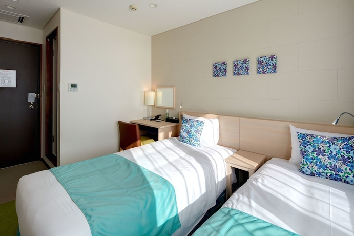 Imagen de la habitación del Hotel Yugaf Inn Okinawa. Foto 11