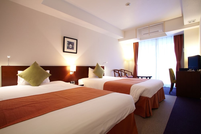 Imagen de la habitación del Hotel Yugaf Inn Okinawa. Foto 12