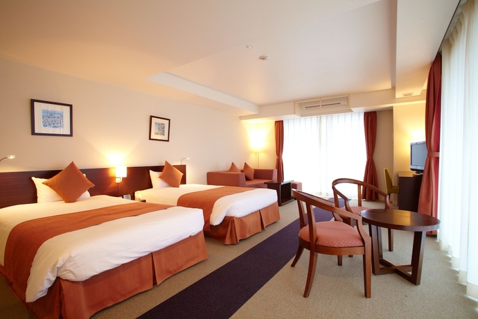 Imagen de la habitación del Hotel Yugaf Inn Okinawa. Foto 15