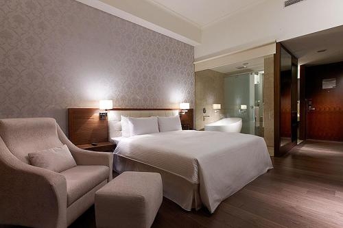 Imagen de la habitación del Hotel Yuh Tong. Foto 8