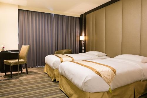 Imagen de la habitación del Hotel Yuhao-zhubei Branch. Foto 7