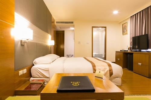 Imagen de la habitación del Hotel Yuhao-zhubei Branch. Foto 9