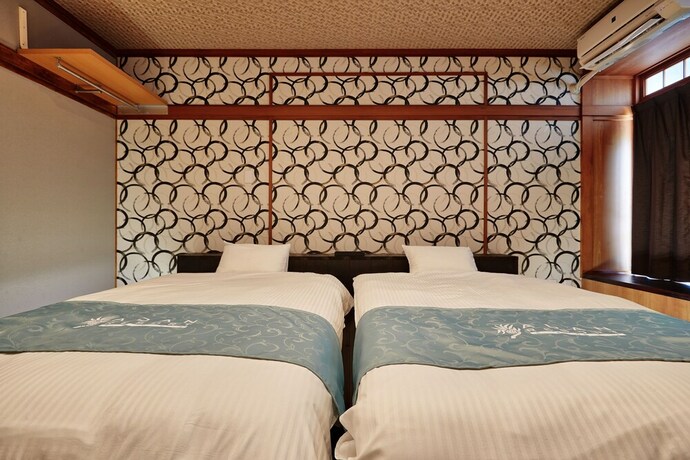 Imagen de la habitación del Hotel Yuhina. Foto 20