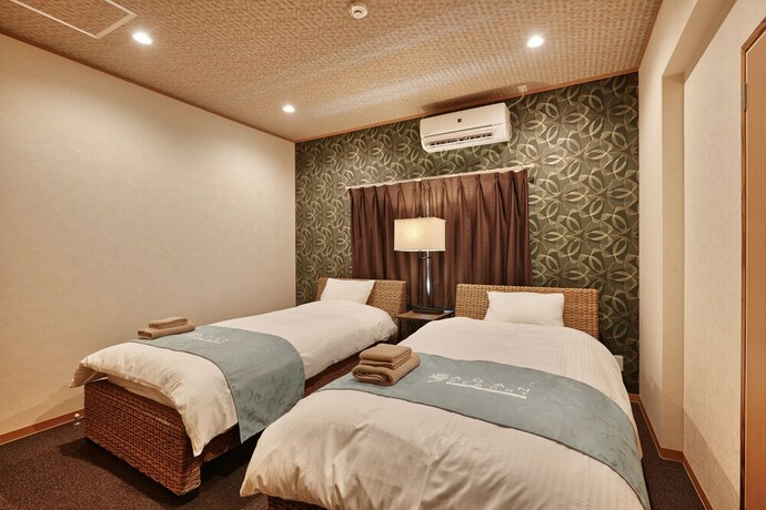 Imagen de la habitación del Hotel Yuhina. Foto 24
