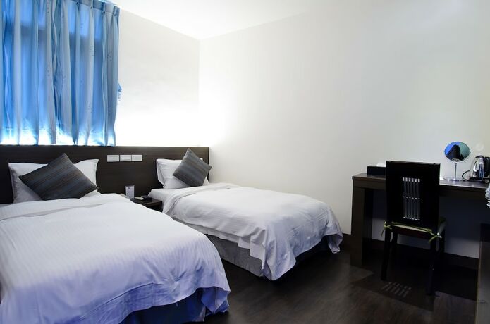 Imagen de la habitación del Hotel Yuh-tarng. Foto 18