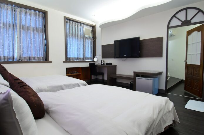 Imagen de la habitación del Hotel Yuh-tarng. Foto 22