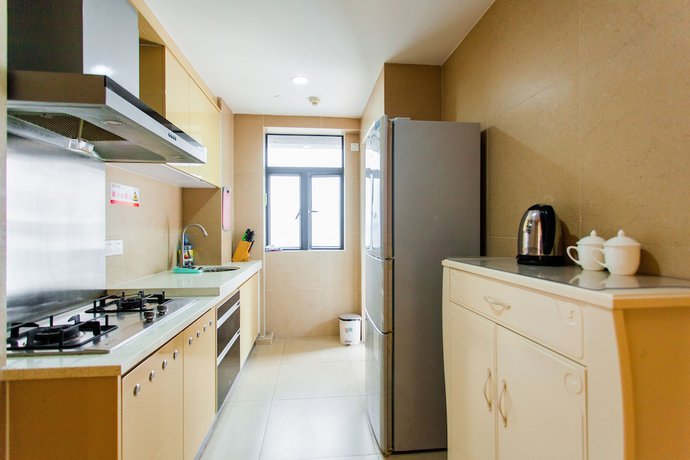 Imagen de la habitación del Hotel Yujia Aparthotel - Zhongshan Lihe Square Branch. Foto 4