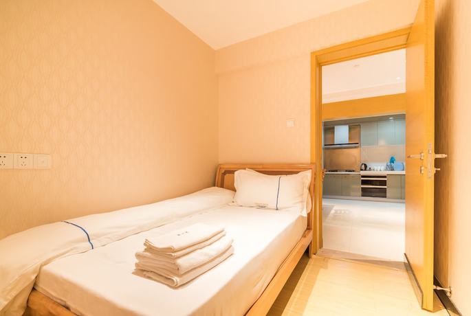 Imagen de la habitación del Hotel Yujia Aparthotel - Zhongshan Lihe Square Branch. Foto 9