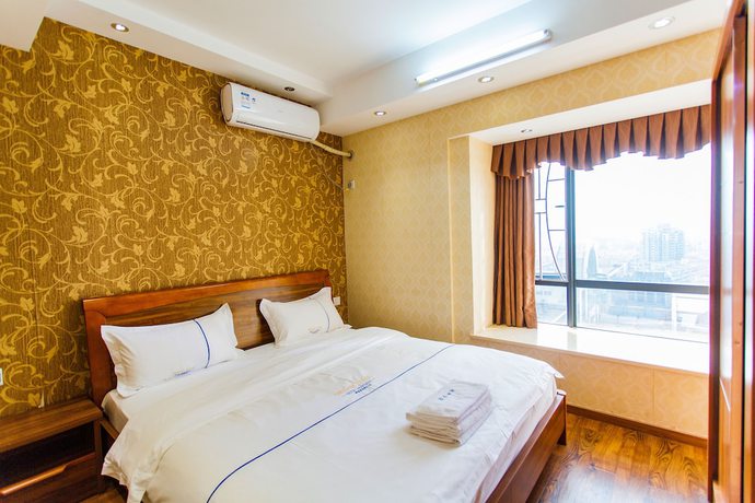 Imagen de la habitación del Hotel Yujia Aparthotel - Zhongshan Lihe Square Branch. Foto 12
