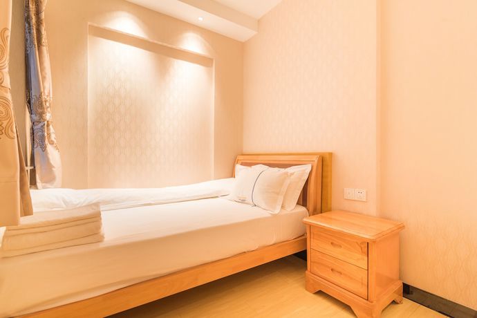 Imagen de la habitación del Hotel Yujia Aparthotel - Zhongshan Lihe Square Branch. Foto 19