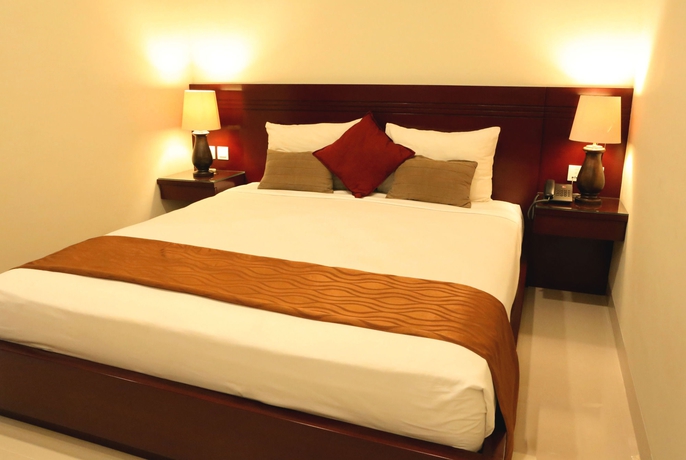 Imagen de la habitación del Hotel Yulia Beach Inn Kuta. Foto 8