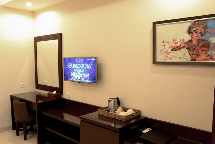 Imagen de la habitación del Hotel Yulia Beach Inn Kuta. Foto 10