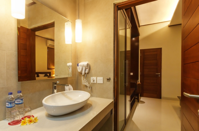 Imagen de la habitación del Hotel Yulia Beach Inn Kuta. Foto 13