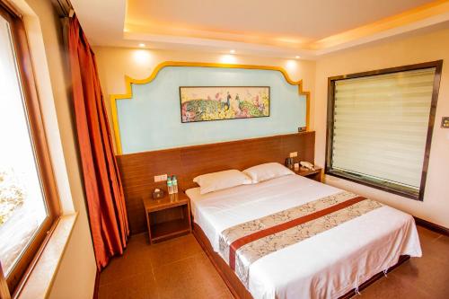 Imagen de la habitación del Hotel Yulin Wanxiang. Foto 13