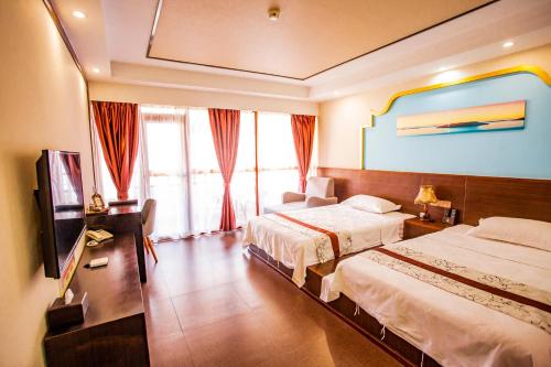 Imagen de la habitación del Hotel Yulin Wanxiang. Foto 14