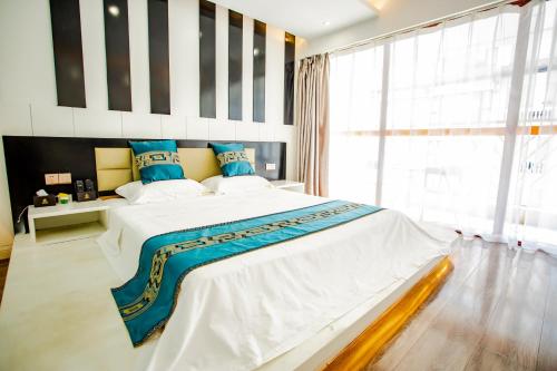 Imagen de la habitación del Hotel Yulin Wanxiang. Foto 15