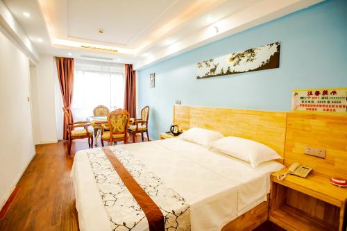 Imagen de la habitación del Hotel Yulin Wanxiang. Foto 16
