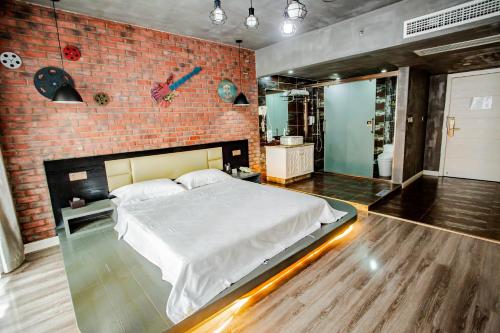 Imagen de la habitación del Hotel Yulin Wanxiang. Foto 17