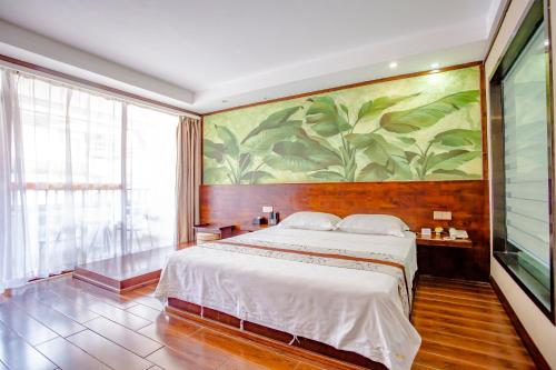 Imagen de la habitación del Hotel Yulin Wanxiang. Foto 19