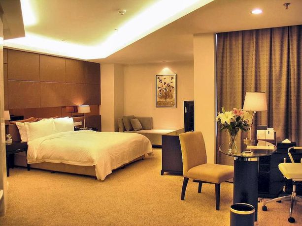 Imagen de la habitación del Hotel Yulong International. Foto 4