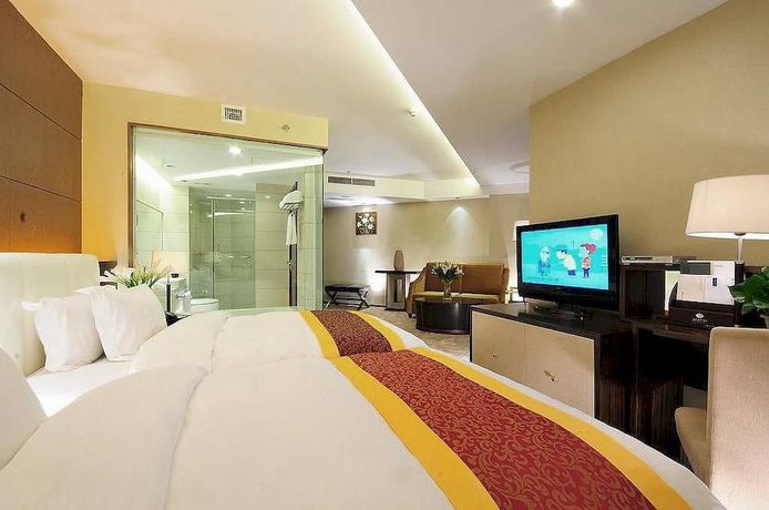 Imagen de la habitación del Hotel Yulong International. Foto 6