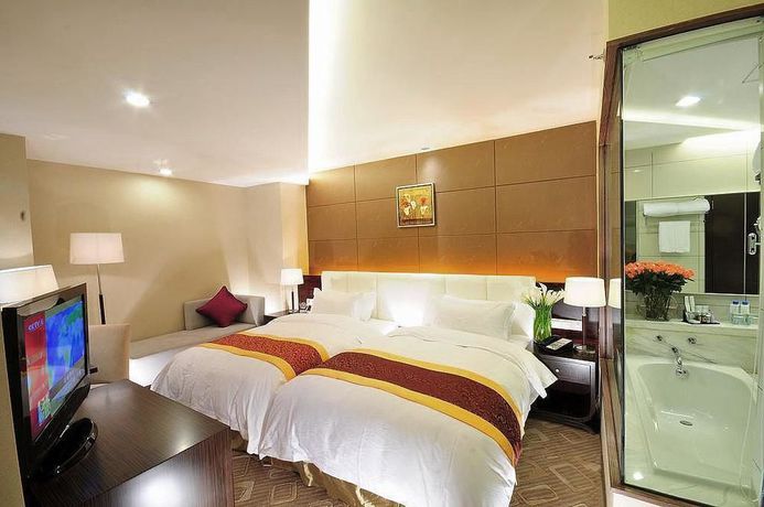 Imagen de la habitación del Hotel Yulong International. Foto 8