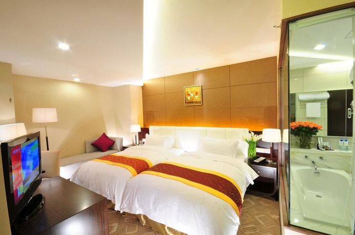Imagen de la habitación del Hotel Yulong International. Foto 9