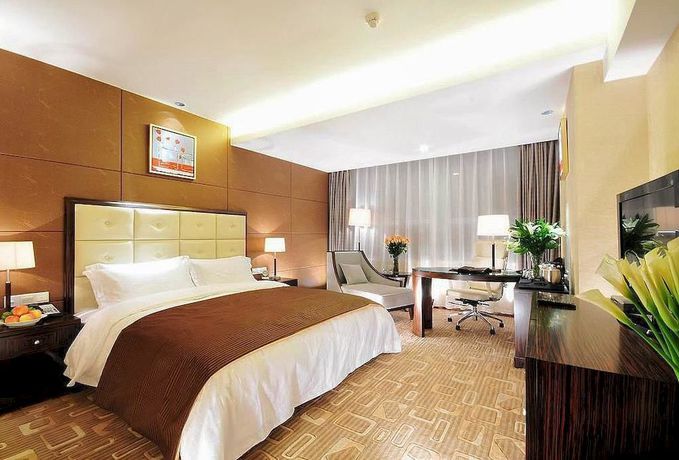 Imagen de la habitación del Hotel Yulong International. Foto 10