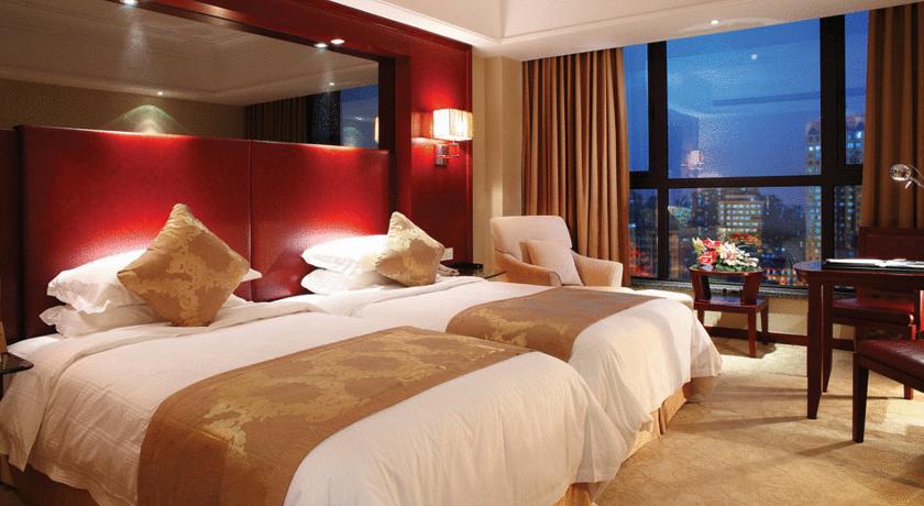 Imagen de la habitación del Hotel Yuloon Shanghai. Foto 4