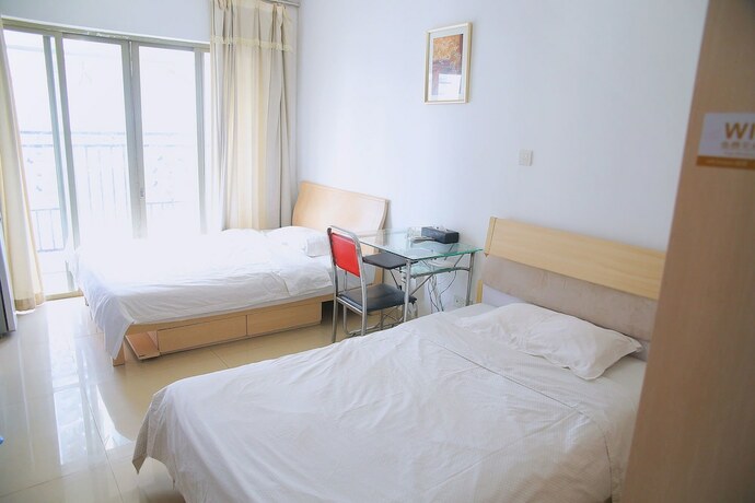 Imagen de la habitación del Hotel Yumi Apartment Zhuguang Gaopai. Foto 20
