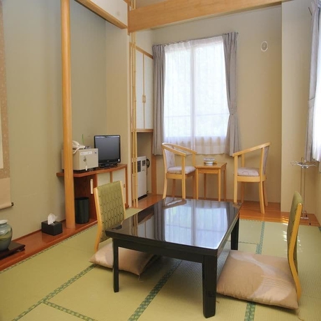 Imagen de la habitación del Hotel Yumoto Ginsenkaku. Foto 8