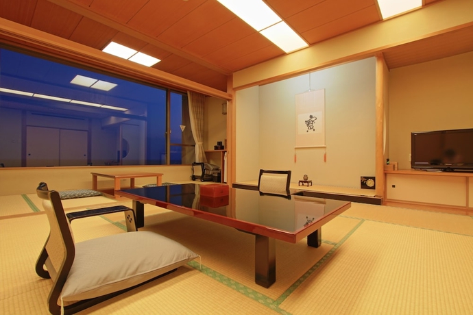 Imagen de la habitación del Hotel Yumotokan New Hamajima. Foto 11