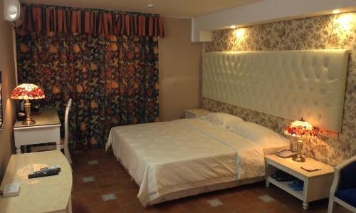 Imagen de la habitación del Hotel Yun Hai Garden. Foto 8