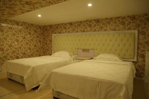 Imagen de la habitación del Hotel Yun Hai Garden. Foto 9