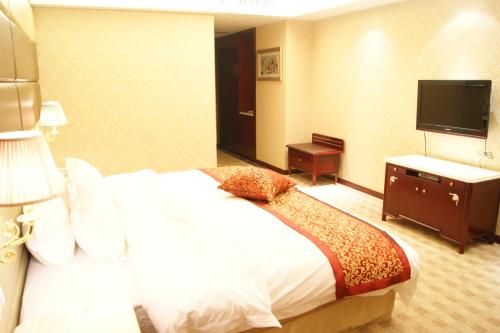 Imagen de la habitación del Hotel Yun Lang Di. Foto 9