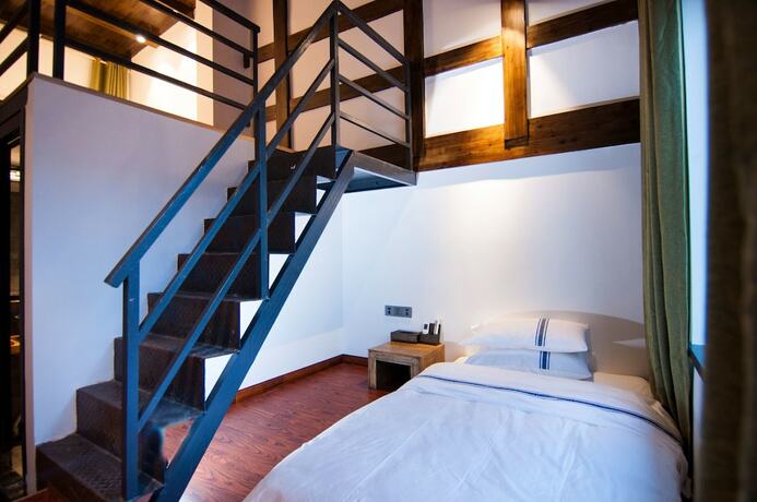 Imagen de la habitación del Hotel Yun Meng Qi Inn. Foto 18