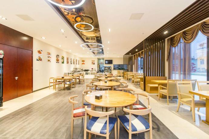 Imagen del bar/restaurante del Hotel Yun Yi Hotel Beijing. Foto 3