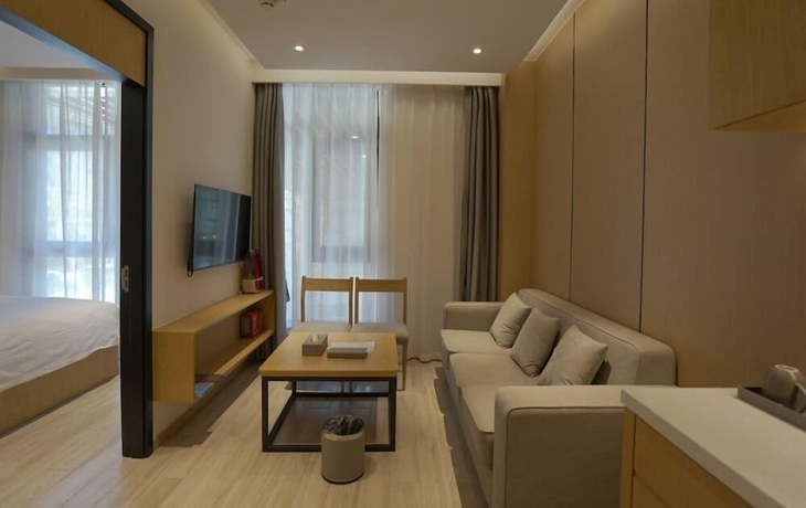 Imagen de la habitación del Hotel YunDing Grand Hotel South Apartment. Foto 4