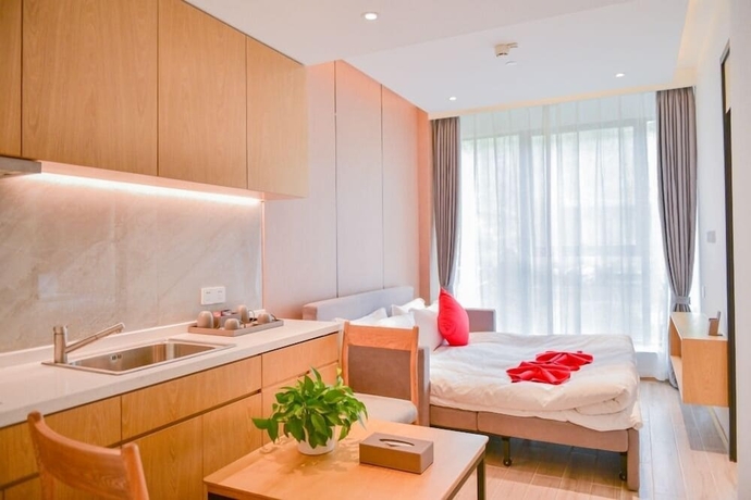 Imagen de la habitación del Hotel YunDing Grand Hotel South Apartment. Foto 6