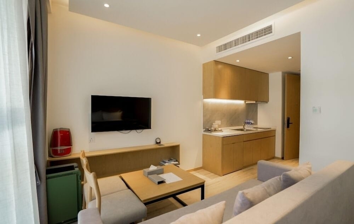 Imagen de la habitación del Hotel YunDing Grand Hotel South Apartment. Foto 7